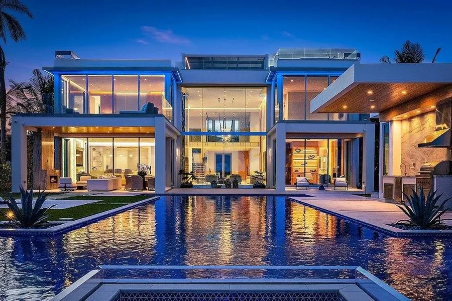 Glass and timber house at dusk